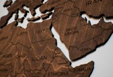 Detailed wooden jigsaw map featuring countries from North Africa and the Middle East.
