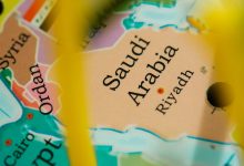 Detailed close-up of a colorful map depicting Saudi Arabia and surrounding countries with emphasis on Riyadh.